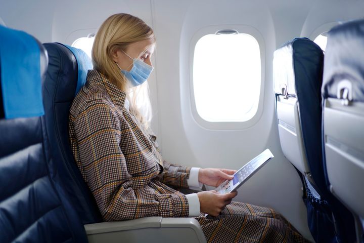 Even after getting the COVID-19 vaccine, you should wear a protective mask if you have to fly.