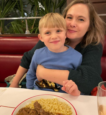 The writer and her son at a meal in France, where they relocated from the U.S.