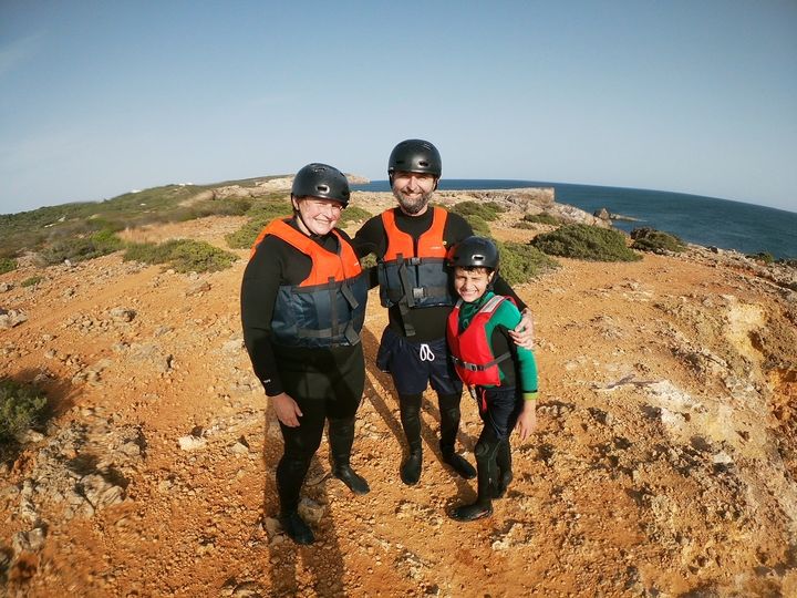 Michelle Kinder, with her husband and son, about to do some cliff jumping in Portugal.