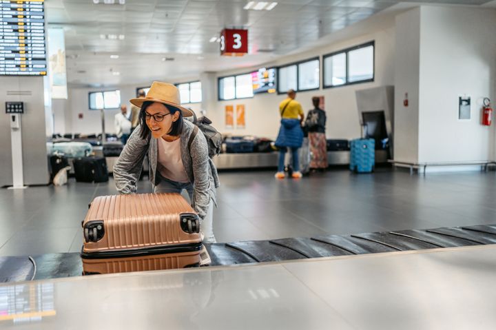 By signing up for status on the airline you're flying, you can enjoy things like a free checked bag.