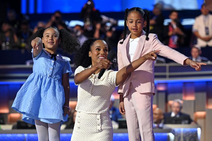 Actor Kerry Washington teaches the public how to pronounce "Kamala" with Kamala Harris' great-nieces Amara and Leela at the Democratic National Convention in Chicago on Aug. 22, 2024. 